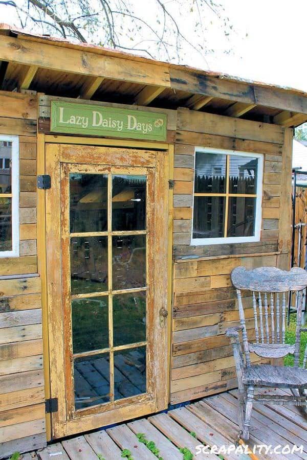 Pallet Garden Shed Roofed Using Tin Cans 2