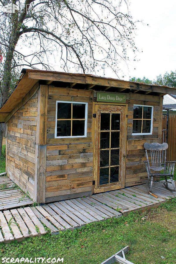 Pallet Garden Shed Roofed Using Tin Cans1