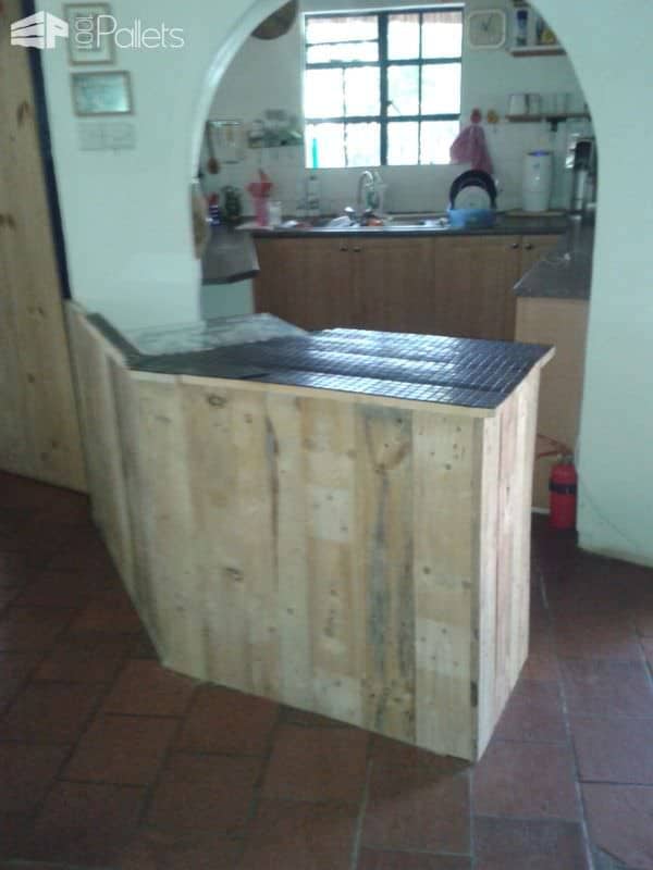 Pallet Kitchen Counter - wood is installed, and the top is tiled in a beautiful dark tone to compliment the light pine and poplar woods.