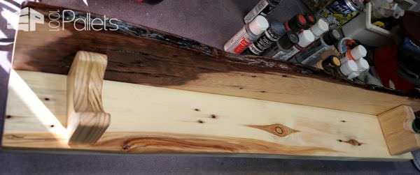 Wood Turned Pallet Bat display shelf - a close-up shot of the poplar board with live-edge work, maple bottom board, and pine U-shaped supports - all pallet wood.