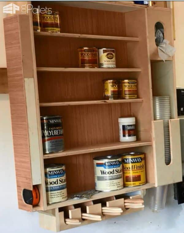 Recycled Wood Finishing Station - this handy cabinet is made from upcycled wood, and it has places for various sizes of stain cans, paint pucks, paint brushes, and even a cup dispenser and rag dispenser. A great addition to your workshop or man cave!