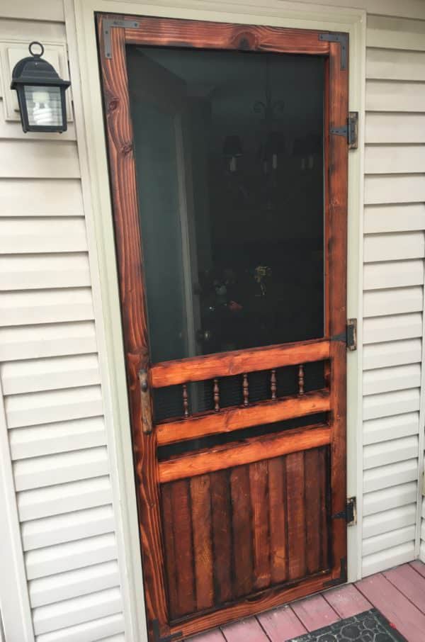 This Pallet Wood Screen Door is much more attractive compared to the aluminum flimsy models you get at the home centers for 100+ dollars!