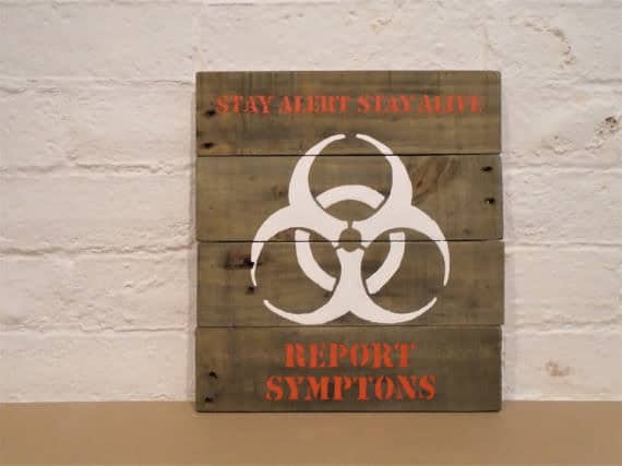 Stay alert, stay alive zombie apocalypse sign is a spooky Halloween Pallet Craft.