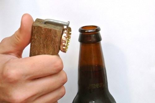 This is certainly not a Weird Wood creation - it is GENIUS! Now be the life of the party or the camping trip when someone forgets to bring the bottle opener.