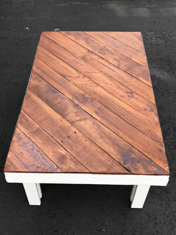 Bias Pallet Coffee Table features a diagonally-installed coffee table top with classic white legs and frame for a modern look..