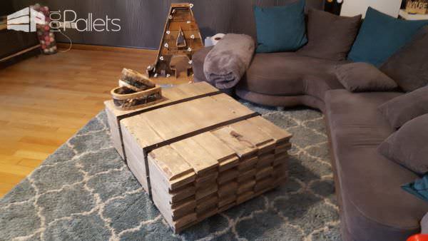 This Stacked Wood Coffee Table is made from pieces of upcycled wood that is then stacked and secured together. There is also a secret storage compartment.