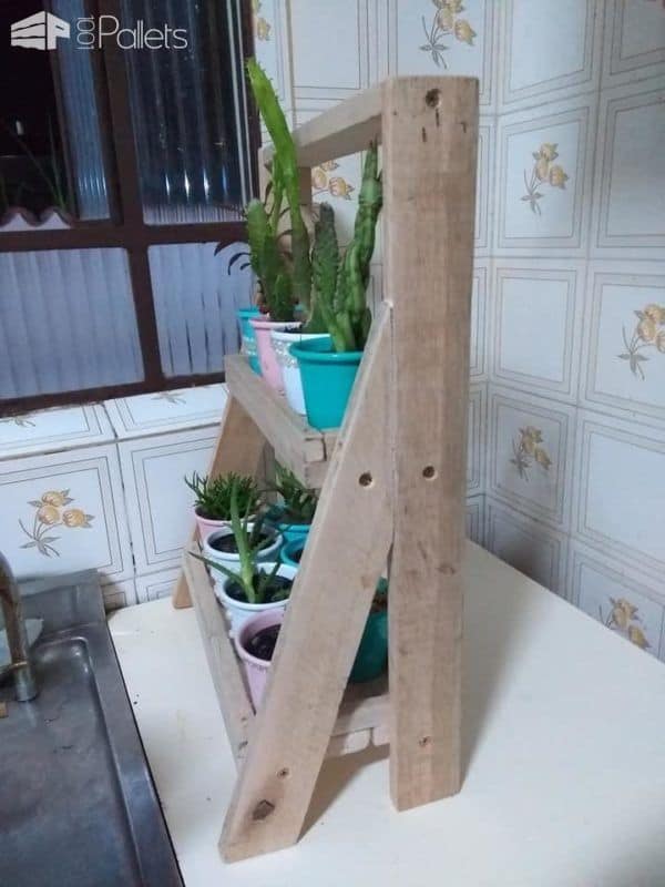 This Pallet Wood Indoor Garden Plant Stand won't take you but a few hours to complete.