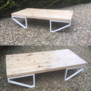 Combine store-bought table legs or brackets to create a modern feel on a shoestring budget. This table would be gorgeous in your living room or in your outdoor living spaces! An excellent DIY Pallet Project for sure!