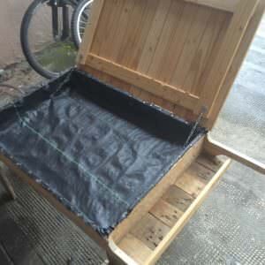 1001pallets.com-wheel-barrow-kiddies-sandpit